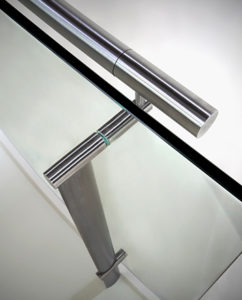 Elliptical post with glass and handrail by HDI Railing Systems